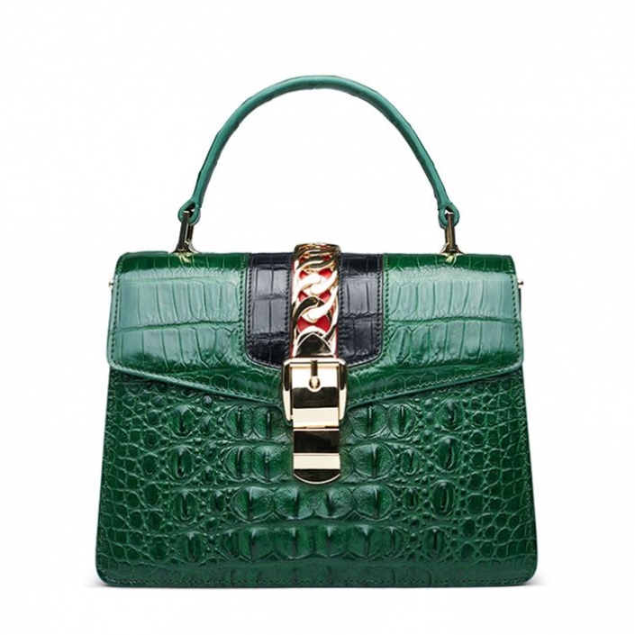 green crocodile purse